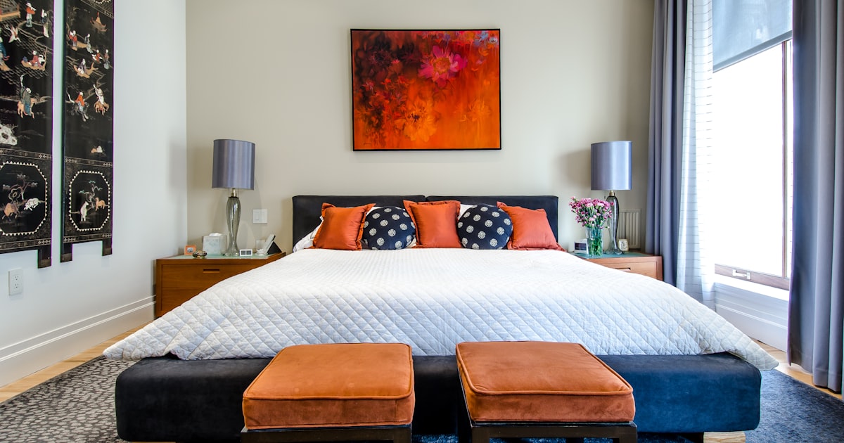 A calm, well-organized bedroom optimized for quality sleep